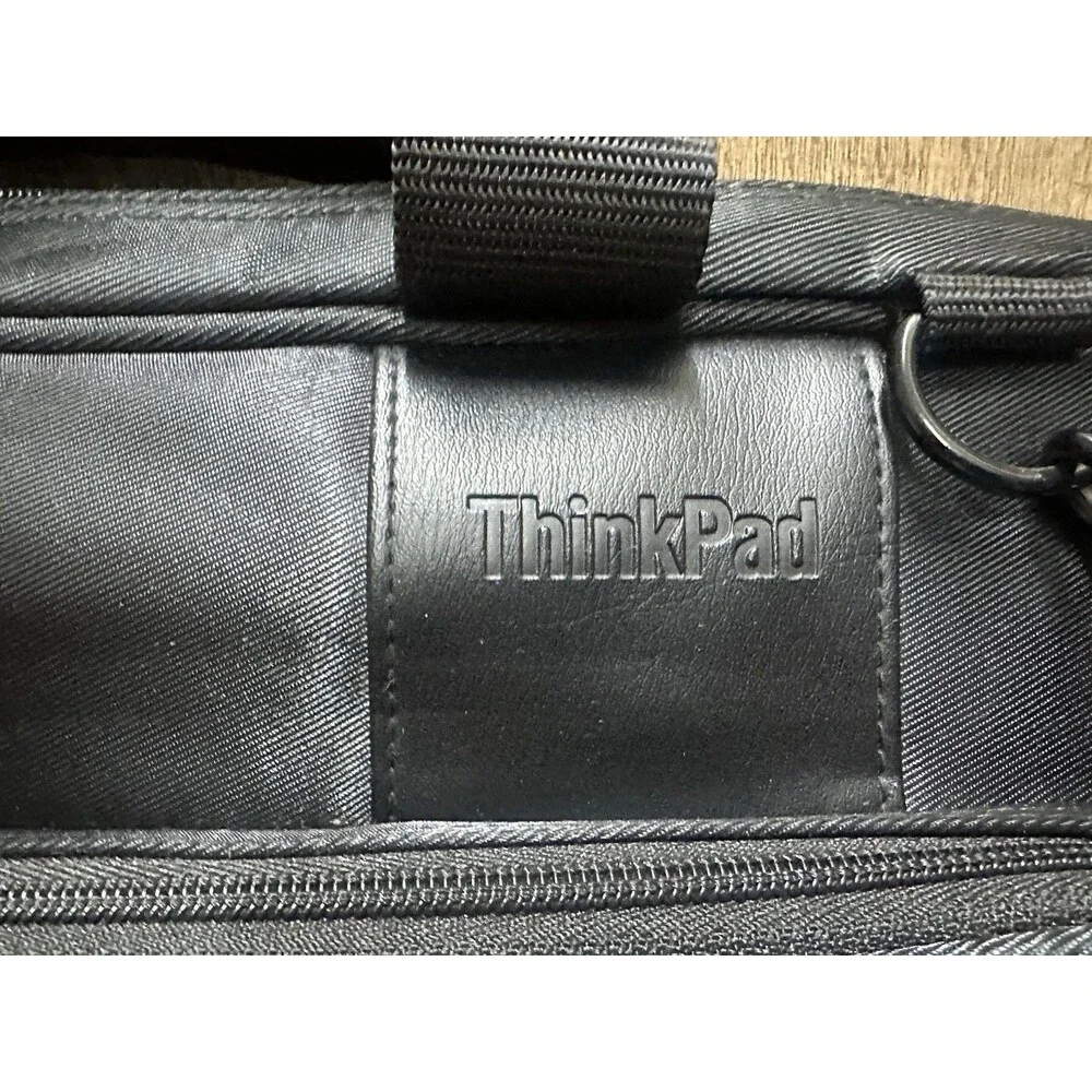 ThinkPad black computer bag with multiple compartments and pockets 16x13 Inches